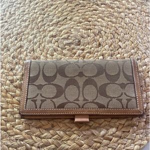 Authentic coach check book cover/wallet.